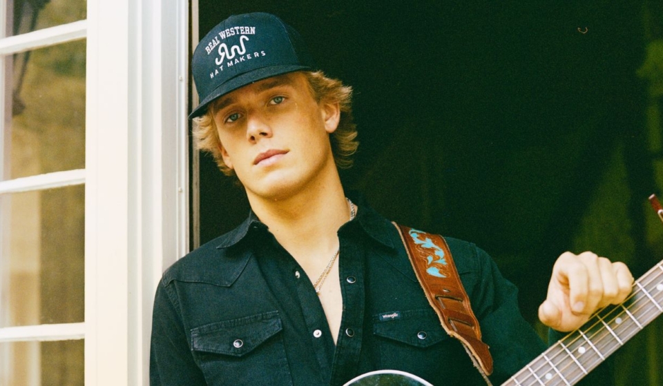 Hudson Westbrook age 21 country music singer from Stephenville Texas in casual western style portrait